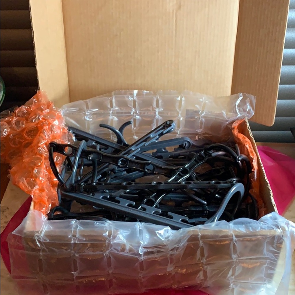 2 sets of 10 Spacesaver Hangers NWOT